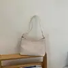 Bolso de Axila de Gama Alta de Nicho para Mujer 2026 Nuevo Verano Textura Tejida Bolso de Hombro Único para Viajes Diarios Bolso Cruzado Tipo Cubo