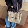 Bolsa de Lona Popular Transfronteriza Gran Capacidad para Mujer 2025 Nueva Casual Ligera Bolso de Mano Bolso Tote de Estilo Coreano de Alta Gama