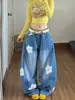 Calça jeans feminina com patch floral bordado estilo coreano, coleção de outono, voltada para exportação, estilo high-street, design longo e fluido, moderna