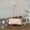 Bolsa de mão doce de nicho estilo coreano para mulheres, novo modelo primavera 2026, bolsa de ombro/axila com laço única e moderna