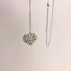 Collar de Corazón con Perlas Plateadas para Mujer 2025 Nuevo Cadena Larga para Clavícula Cadena para Suéter de Lujo Ligero Nicho Accesorios