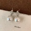 Brincos Doudou Pérola 2025 Novo Estilo Quente Personalidade de Alto Padrão Moda Brincos Versáteis Acessórios de Orelha Únicos Tarraxas