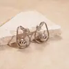 Pendientes de Bola Metálica Retorcida Europeos y Americanos, Pendientes de Botón de Personalidad Única de Nicho, Pendientes Elegantes y de Alta Gama