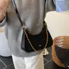 Bolso de Hombro Retro de Cadena de Alta Gama Otoño/Invierno para Mujer 2026 Nuevo Pequeño de Nicho Versátil para Viajes Diarios de un Solo Hombro Cruzado