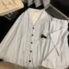Pijama de forro polar estilo dulce con nudo de mariposa, nuevo conjunto de cárdigan de manga larga de moda otoño/invierno para mujer