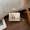 Bolsa de corrente com trama de losangos feminina verão 2026 nova pequena design de nicho bolsa de ombro único transversal bolsa quadrada pequena com toque de alta qualidade para segurar na mão