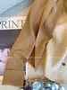 Cárdigan de punto para mujer con cuello polo falso de dos piezas, estilo "old money", nueva colección otoño 2026, top corto elegante y relajado para el trabajo