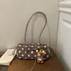 Elegante e requintada bolsa de ombro e bolsa de mão com bolinhas grandes, da nova coleção outono 2026, uma peça de nicho, alta qualidade, moderna e versátil.