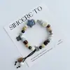 Pulsera de Cerámica Jingdezhen Nueva Historieta China Pulsera Boutique Venta al por Mayor Estudiante Joker Explosiones Puesto del Mercado Nocturno Pulsera
