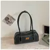 Bolso de axila retro de nicho transfronterizo para mujer, nuevo y elegante bolso de mano de alto valor para el día a día, bolso de hombro texturizado versátil y moderno