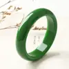 Venta al por mayor de fábrica material exterior imitación Jade Hetian Pulsera de Jaspe pulsera fina redonda de jade verde espinaca pulsera de jade para mujer