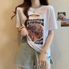Camiseta de manga corta con hombros descubiertos estilo americano para mujer, diseño Sense Niche, nueva camiseta de verano holgada, ahuecada y adelgazante de algodón puro.