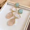Pendientes de botón de resina con textura ovalada degradada de aguja plateada para mujer, pendientes de diseño transfronterizo europeo y americano, joyería de oreja de nicho
