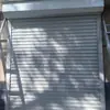 Portas de rolo em aço inoxidável, portas de rolo à prova de fogo para armazéns, portas de rolo elétricas industriais - atacado disponível, e pedidos personalizados são bem-vindos