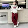 Conjunto de Pantalones Cargo para Niñas Primavera y Otoño 2025 Nuevo Conjunto Deportivo de Sudadera para Niños Estilo Occidental Ropa de Primavera para Niñas Mayores
