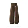 En stock Otoño 2026 Nuevo Estilo High Street Pantalones de Guadaña Casuales Talla Grande Cintura Torcida Cadena Rotos K685