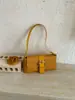 Bolso transfronterizo retro de alta gama con patrón tejido para mujer, nuevo bolso de mano moderno y exquisito, bolso de hombro y cruzado versátil, moderno