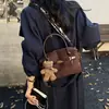 Bolsa de Pelúcia Camurçada Super Quente de Nicho Feminina 2026 Estilo Novo Transfronteiriço Moda Tendência Toque de Luxo Bolsa Transversal Exquisita Bolsa Boston