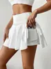Nova Mini Saia Plissada Estilo Tênis Feminina Cintura Alta Emagrecimento Anti-Exposição Calça de Segurança Embutida Skort Esportivo Fitness Semi