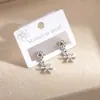 Pendientes Colgantes de Copo de Nieve Minimalistas, Personalizados, Versátiles, de Diseño de Nicho Transfronterizos, Pendientes de Flor de Acero Inoxidable Retro Europeos y Americanos