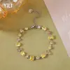 Pulsera de cristal de circonita púrpura y champán de lujo ligero estilo europeo y americano, diseño de nicho de acero inoxidable, joyería exclusiva al por mayor transfronteriza