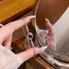 Estilo europeo y americano, sutilmente incrustado con circonita cúbica, pulsera versátil para mujer, lujo ligero, diseño de nicho con un toque de alta gama, ajustable y extensible, al por mayor