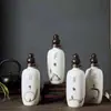 Desecho barato de botella de vino de cerámica de Jingdezhen un kilo frasco sellado botella vacía botella de vino blanco tanque de almacenamiento almacenamiento privado frasco de burbujas