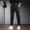 Pantalones deportivos casuales de verano finos con cintura elástica para hombre, elásticos, ajustados, estilo skinny, nuevos, combinan con todo, de seda helada para hombre