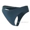 Calcinha fio dental feminina lisa de cor sólida estilo europeu e americano, sexy para yoga e fitness, cintura baixa, seda gelada, secagem rápida, design de peça única que levanta o bumbum