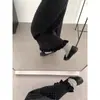 Saia midi de malha preta com bolinhas estilo francês para mulheres, design outono/inverno, cintura alta, ajustada ao quadril, linha A, saia longa de corte reto