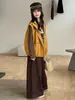 Conjunto de Chaleco de Cuero y Pantalones para Niñas 2026 Nuevas Llegadas de Otoño Tallas Mediana y Grande Estilo Coreano Pantalones de Pierna Ancha a Cuadros Conjunto de Tres Piezas en Capas