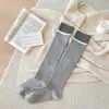 Estilo ballet serie miu color block doble costura adelgazante JK pierna bonita prenda exterior calcetines para muslo chica estilo escolar calcetines largos holgados