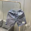 Shorts masculino de verão finos secagem rápida seda gelada calças casuais da moda novas folgadas respiráveis