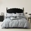 Nuevo juego de ropa de cama de cuatro piezas de gasa doble estampada, grado A, apto para bebés y madres, ropa de cama tejida estampada de doble capa para todas las estaciones