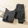 Ropa interior térmica nueva de Otoño e Invierno para hombre y mujer, traje de corte casual ajustado sin costuras, ropa interior térmica cepillada por ambos lados