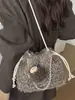 Bolsa Nueva de Mujer Otoño 2026 Bolso Cubo Moderno y Único Bolso de Hombro de Felpa Bolso Esponjoso de Color Sólido de Alto Valor