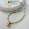 Collar con Colgante de Esmalte Jixiang y Piedra Natural para Mujer, Cadena de Clavícula Ligera de Lujo Nicho de Verano, Joyería de Cadena para el Cuello con Perlas de Alta Gama
