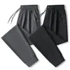 Pantalones de secado rápido de seda de hielo para hombres y mujeres 2024 verano nuevos leggings deportivos casuales pantalones rectos outlet de fábrica