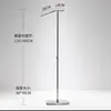 Estante de exhibición de piso de acero inoxidable para tiendas de ropa, perchero colgante plateado para tiendas de ropa para hombres y mujeres