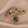 Novo broche estilo antigo de alta qualidade ins para mulheres estilo chinês leque borla pino de terno placket de pressão cheongsam corsage atacado