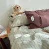 Juego de cuatro piezas de algodón puro con borde de algodón lavado, estilo popular en Xiaohongshu, juego de tres-cuatro piezas totalmente de algodón para estudiantes de dormitorio