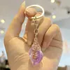 Suministro Directo de Fábrica Acrílico Transparente Artificial Sueño Luminoso Caracola DIY Pareja Puesto de Coche Llavero Al por Mayor
