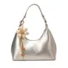 Bolsa pequena de couro oleado texturizado de alta qualidade para mulheres, nova moda 2026, bolsa transversal versátil, bolsa de mão pequena super popular para ombro ou axila