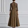 Vestido Feminino Longo Estampado de Leopardo com Gola Reversível e Mangas Longas, Nova Moda Europeia e Americana Transfronteiriça Outono/Inverno 2026