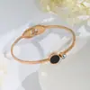Pulseira de Aço Titânio Moda Europeia e Americana, Pulseira de Ouro Rosa Preto de Nicho, Joia Redonda para Mãos de Mulheres, Vendas Diretas da Fábrica e Atacado
