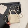 Bolsa Balde Simples Nova Primavera 2025 com Fivela Dupla para Mulheres, Bolsa Transversal Texturizada Nicho Cor Sólida, Bolsa de Mão Moderna e Estilosa