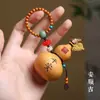Peça de Mão de Cabaza Natural com Design Versátil, Adequada como Acessório de Bolsa para Homens e Mulheres, um Brinquedo para Alívio do Estresse para Mãos Pequenas
