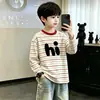 Camiseta de Manga Larga Rayada Estilo Coreano para Niños 2026 Nueva Llegada de Primavera Ropa Interior para Niños Camiseta Base de Algodón Puro Tallas Mediana y Grande