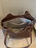 Bolso grande de Shuai Mi Jia para mujer 2026 nuevo bolso de hombro de nicho para el trabajo para estudiantes universitarios que van a clase bolso tote