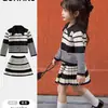 Conjunto de Malha para Meninas Outono e Inverno 2026 Novo Estilo Coreano Cardigã de Lã Listrado Saia Plissada Estilo Acadêmico Conjunto de Duas Peças